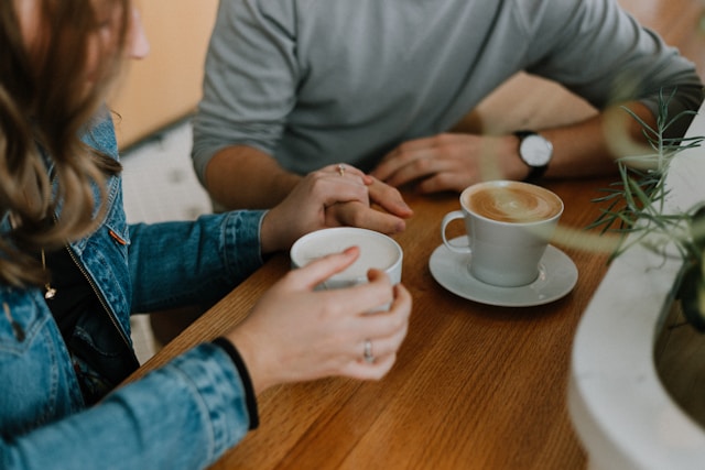 PL-couple-talking-coffee-unsplash